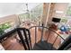 Spiral staircase overlooks the main living area, which features vaulted ceilings and abundant natural light at 12171 S Critchell Ln, Littleton, CO 80127