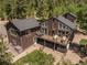 Aerial view of two-story home with deck and hot tub at 12171 S Critchell Ln, Littleton, CO 80127