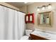 Simple bathroom with a shower/tub combo and updated vanity at 12171 S Critchell Ln, Littleton, CO 80127