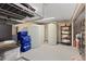 Unfinished basement with large water tanks and ample storage at 12171 S Critchell Ln, Littleton, CO 80127