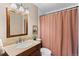 Clean bathroom with granite vanity, updated fixtures, and shower/tub combo at 12171 S Critchell Ln, Littleton, CO 80127