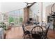 Bright dining area with wood floors and view to deck at 12171 S Critchell Ln, Littleton, CO 80127