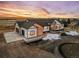 Aerial view of a house showcasing the front facade and attached garage at 44035 Pony Express Ct, Elizabeth, CO 80107