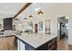 Open concept kitchen with large island at 44035 Pony Express Ct, Elizabeth, CO 80107