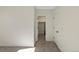 Walk-in closet with double hanging rods and neutral carpeting at 44035 Pony Express Ct, Elizabeth, CO 80107