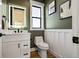 Charming powder room with a modern vanity and toilet at 44035 Pony Express Ct, Elizabeth, CO 80107
