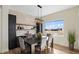 Modern dining room with built-in shelving at 44035 Pony Express Ct, Elizabeth, CO 80107