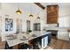 Modern kitchen with large island and wood accents at 44035 Pony Express Ct, Elizabeth, CO 80107
