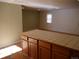 Kitchen island with wood cabinets and tile countertop at 765 S Krameria St, Denver, CO 80224