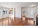 Formal dining room featuring hardwood floors and lots of natural light at 24940 E Roxbury Pl, Aurora, CO 80016