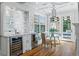 Kitchen breakfast nook with built-in seating and French doors leading outside at 110 N Franklin St, Denver, CO 80218
