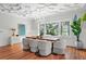 Formal dining room with hardwood floors, large windows, and elegant chandelier at 110 N Franklin St, Denver, CO 80218