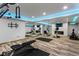 Home gym with various equipment and a fireplace at 110 N Franklin St, Denver, CO 80218
