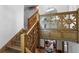 Grand staircase with ornate woodwork leading to the upper level at 110 N Franklin St, Denver, CO 80218