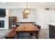 Bright dining area with a rustic farmhouse table and bench at 3450 N Downing St # 3, Denver, CO 80205