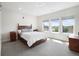 Bright bedroom with a double bed and large windows at 3450 N Downing St # 3, Denver, CO 80205