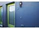 Building entrance with modern lime green door at 3450 N Downing St # 3, Denver, CO 80205