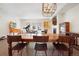 Spacious dining area with a rustic wooden table at 3450 N Downing St # 3, Denver, CO 80205