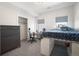 Bright bedroom with a built-in desk and closet at 3450 N Downing St # 3, Denver, CO 80205