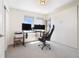 Home office with a standing desk and large monitors at 3450 N Downing St # 3, Denver, CO 80205