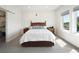 Bedroom with a double bed and large windows at 3450 N Downing St # 3, Denver, CO 80205