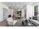 Open concept living room and kitchen area with modern design at 18633 Stroh Rd # 1-102, Parker, CO 80134