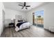 Bright bedroom with sliding door to private balcony at 18633 Stroh Rd # 1-102, Parker, CO 80134