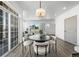 Bright dining area with a round table and access to a patio at 18633 Stroh Rd # 1-102, Parker, CO 80134
