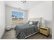 Cozy bedroom with a large window and modern decor at 18633 Stroh Rd # 1-102, Parker, CO 80134
