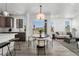 Modern dining area with kitchen and living room views at 18633 Stroh Rd # 1-102, Parker, CO 80134