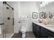 Spa-like bathroom with a walk-in shower and double vanity at 18633 Stroh Rd # 1-102, Parker, CO 80134