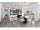 Modern kitchen with stainless steel appliances and an island at 18633 Stroh Rd # 1-102, Parker, CO 80134