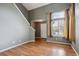 Bright living room with hardwood floors and entryway at 19883 E Vassar Ave, Aurora, CO 80013