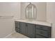 Modern bathroom with gray vanity and quartz countertop at 7264 Siena Way # C, Boulder, CO 80301