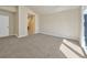Spacious bedroom with carpet flooring and large window at 7264 Siena Way # C, Boulder, CO 80301