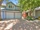 Townhouse with two-car garage and a brick paved courtyard at 7264 Siena Way # C, Boulder, CO 80301
