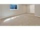 Finished basement room with carpet and a window at 7264 Siena Way # C, Boulder, CO 80301