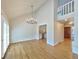 Open dining room with hardwood floors and chandelier at 7264 Siena Way # C, Boulder, CO 80301