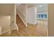 Wood staircase leading to the upper level at 7264 Siena Way # C, Boulder, CO 80301