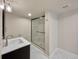 Basement bathroom with shower and vanity at 7264 Siena Way # C, Boulder, CO 80301