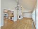 Bright living room with hardwood floors, fireplace, and built-in shelving at 7264 Siena Way # C, Boulder, CO 80301