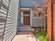 Private gated entrance with brick walkway and pergola at 7264 Siena Way # C, Boulder, CO 80301