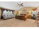 Main bedroom with vaulted ceilings and sitting area at 23450 Bent Oaks Way, Parker, CO 80138