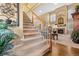 Elegant staircase leading to the upper level of the home at 23450 Bent Oaks Way, Parker, CO 80138