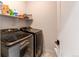 Convenient laundry room with washer and dryer at 6043 N Nepal St, Aurora, CO 80019