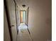 Long hallway with doors to other rooms at 3901 E Orchard Rd, Centennial, CO 80121