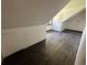 Small attic bedroom with sloped ceilings at 3901 E Orchard Rd, Centennial, CO 80121