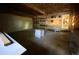 Spacious garage with workshop area and shelving at 3901 E Orchard Rd, Centennial, CO 80121