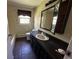 Bathroom with vanity, toilet, and bathtub at 3901 E Orchard Rd, Centennial, CO 80121