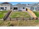 Large fenced backyard with grassy area, perfect for outdoor enjoyment at 27646 E 10Th Dr, Aurora, CO 80018